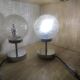 Duo of textured globe lamps with a large play of light.