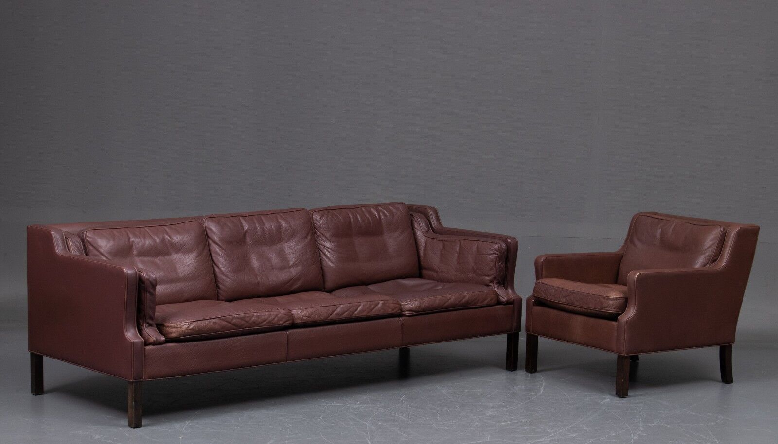 Three-seater leather sofa and one-seater armchair, scandinavian style