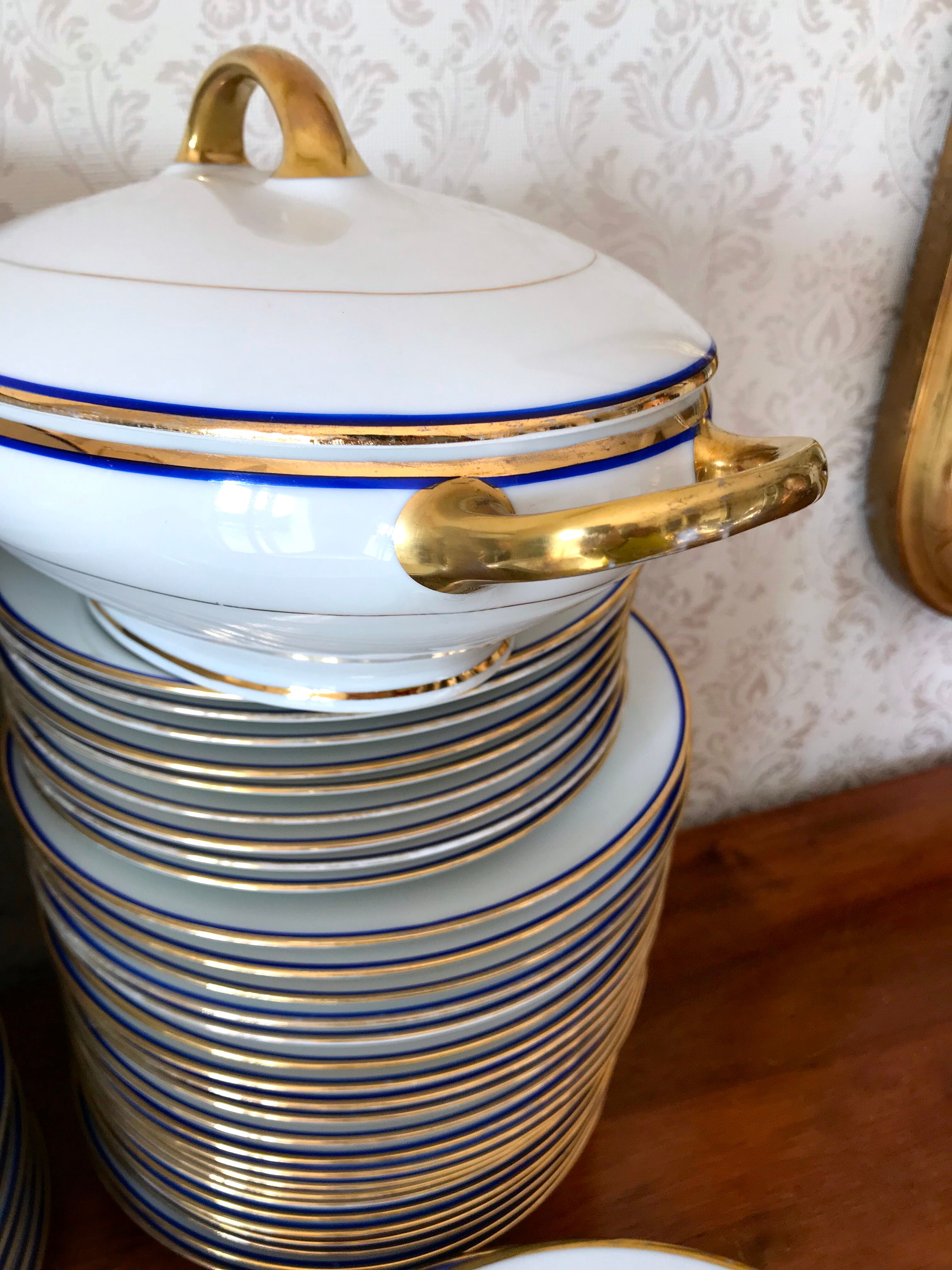 table service art deco limoges porcelain white border blue and gold 61 pieces signed