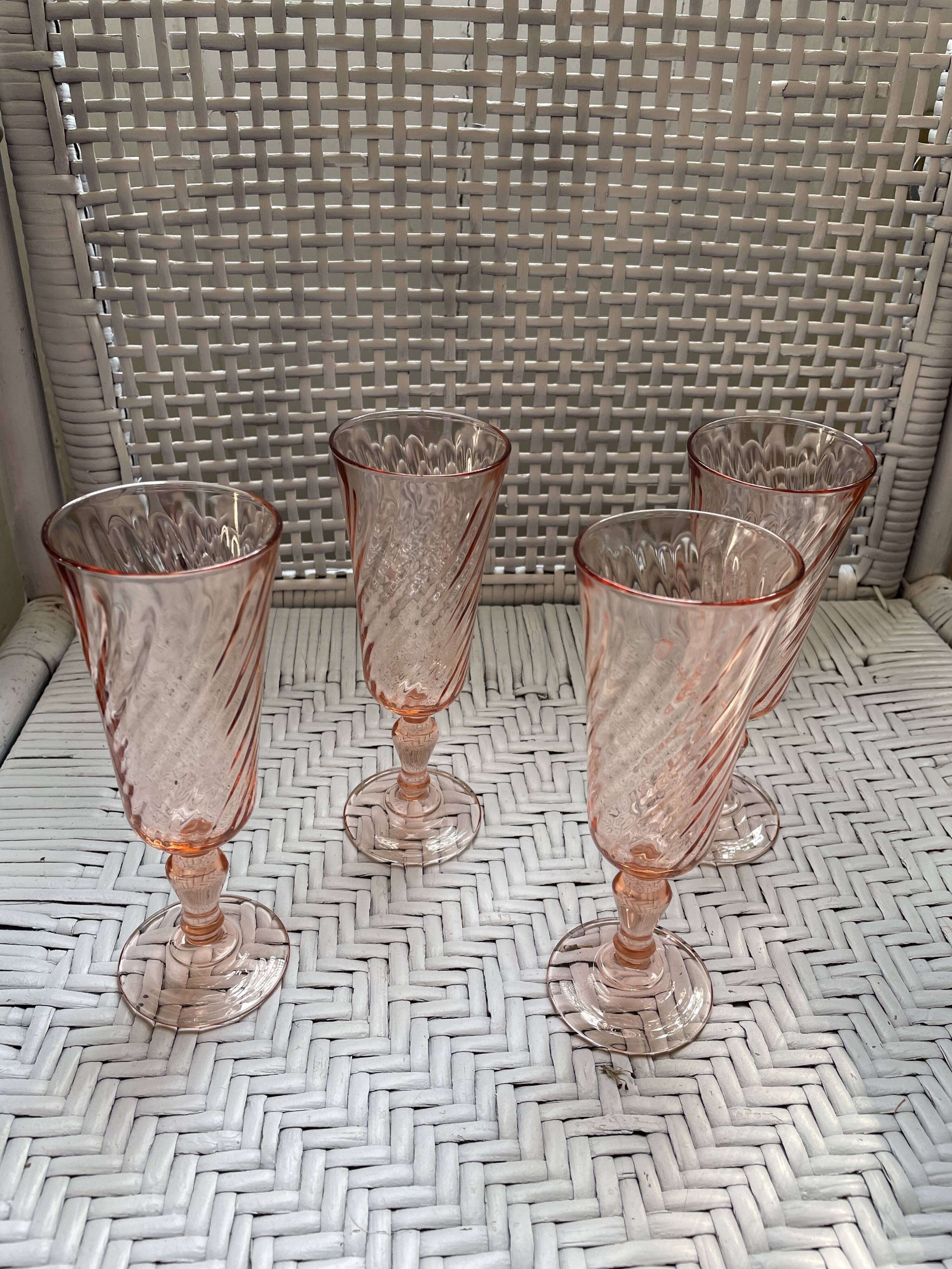 Pink glass champagne flutes from Arcoroc Luminarc model Rosaline