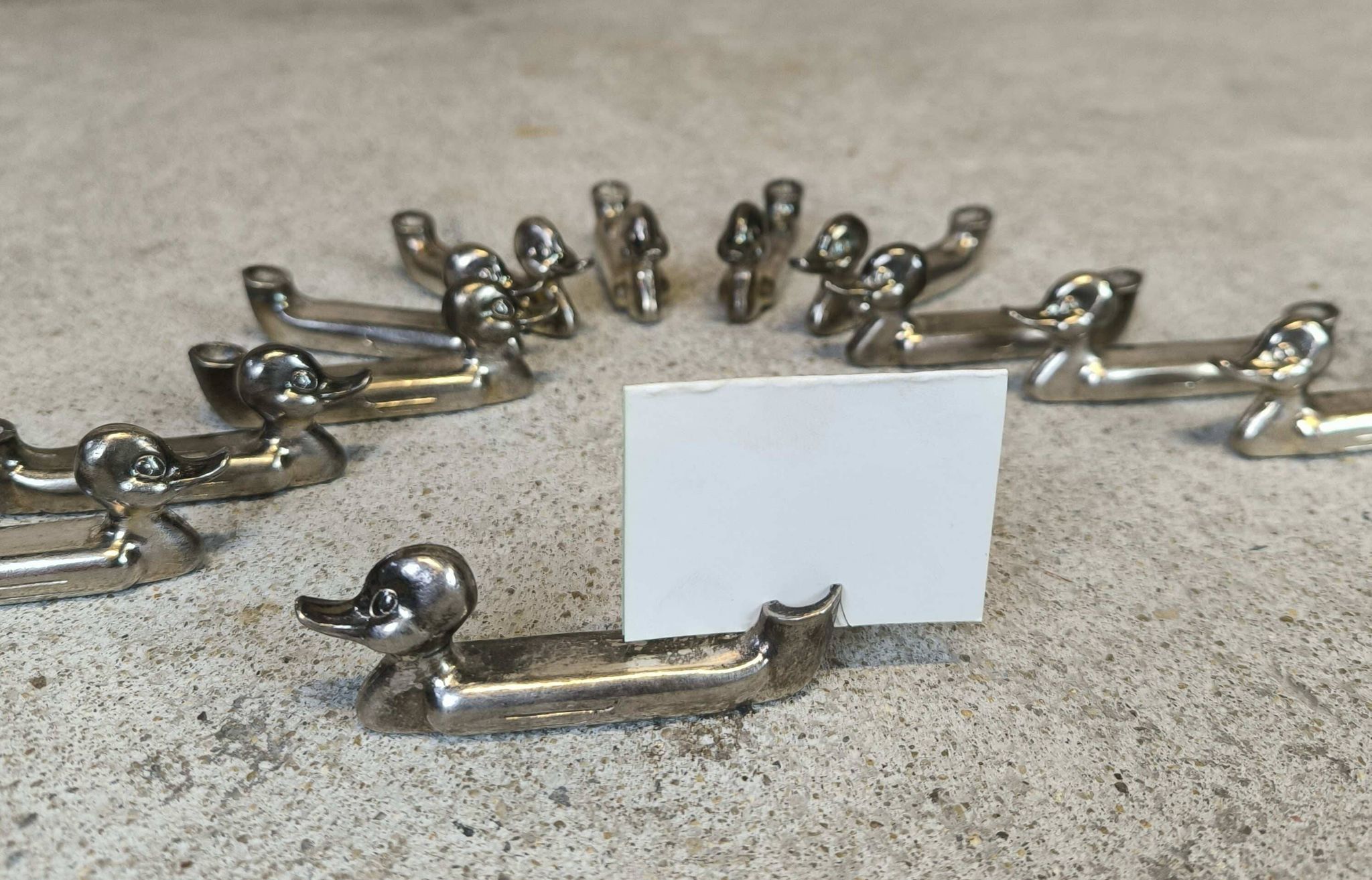 Set of 12 vintage knife rests, place card holders.