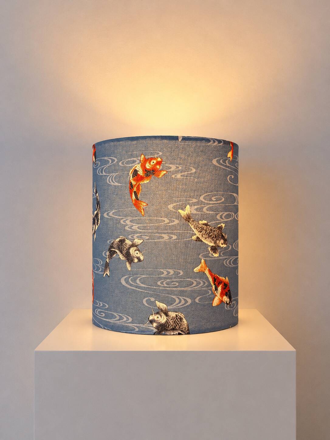 Handmade lampshade covered with Japanese fabric featuring car patterns.