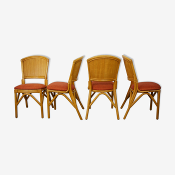 Suite of 4 chairs in Italian rattan design from the 60/70