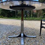 Adjustable round table in steel and glass