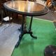 Pedestal table in blackened and fruit wood