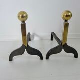 Pair of modernist steel and brass andirons