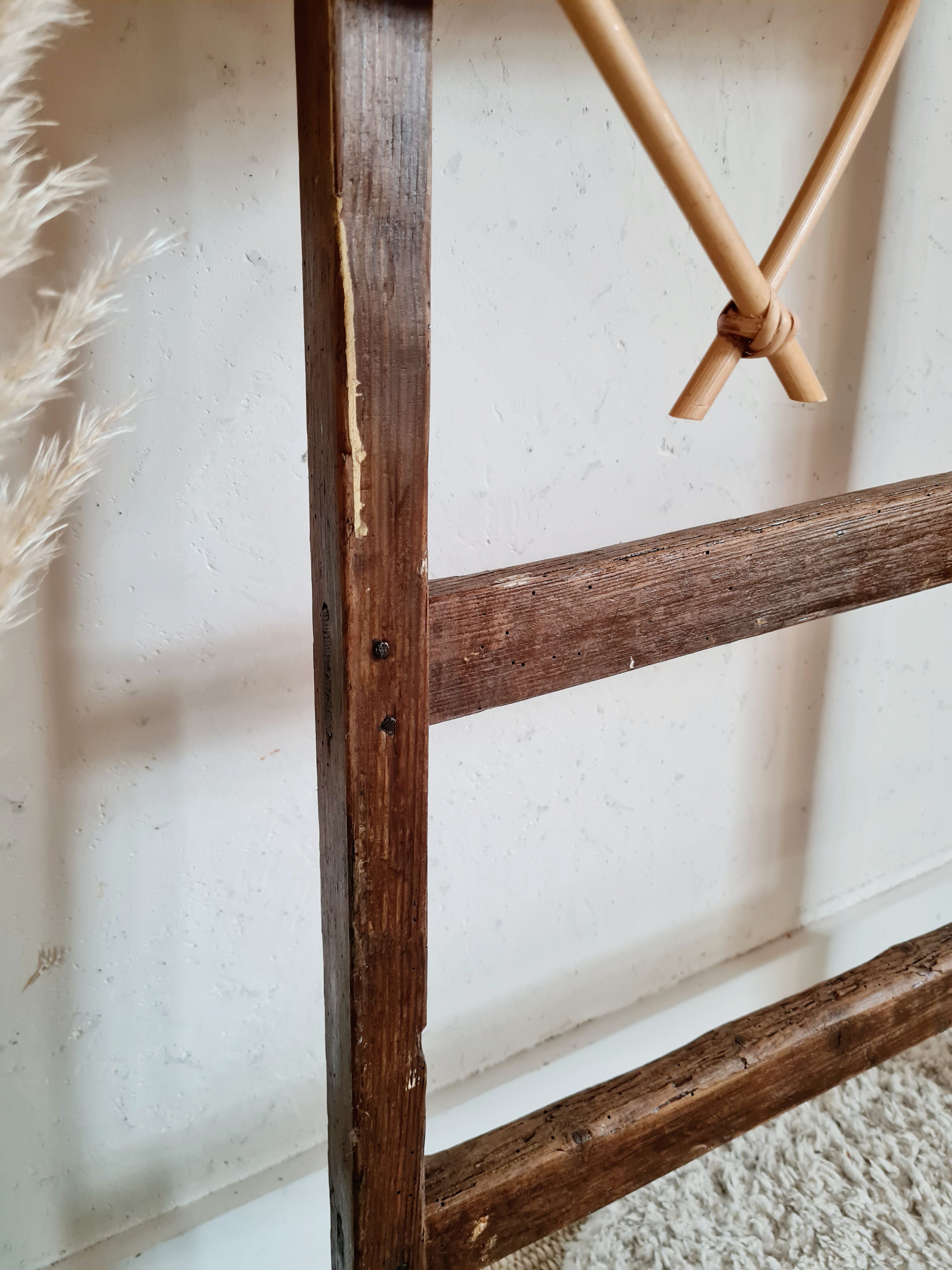 Old wooden farm ladder