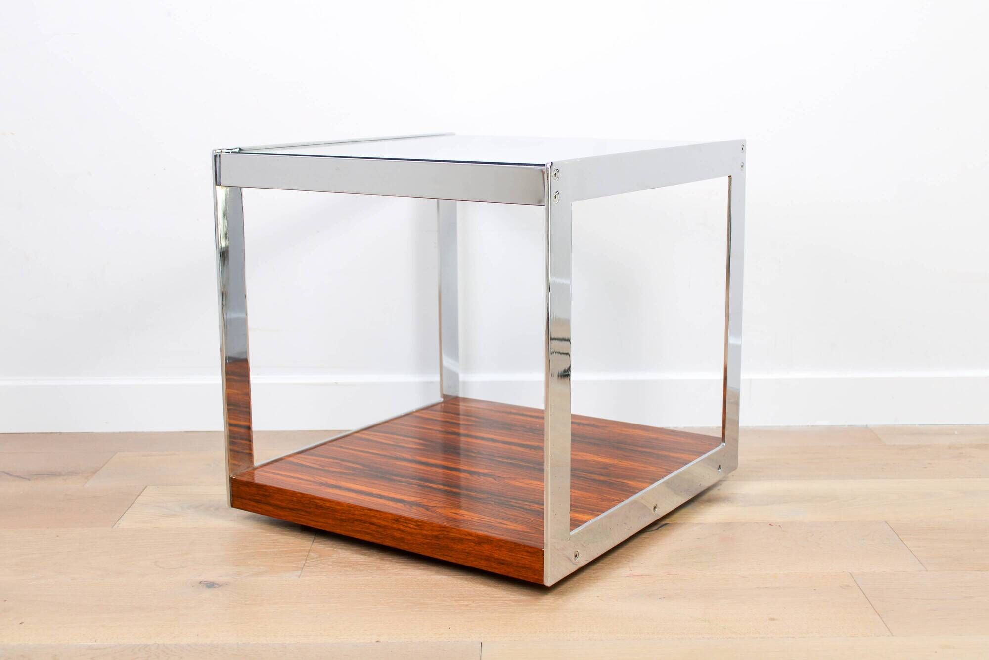 A vintage mid-century glass and rosewood side table by Merrow Associates