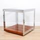 A vintage mid-century glass and rosewood side table by Merrow Associates