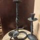 Set of 3 candlesticks and a candle holder in wrought iron.