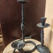 Set of 3 candlesticks and a candle holder in wrought iron.