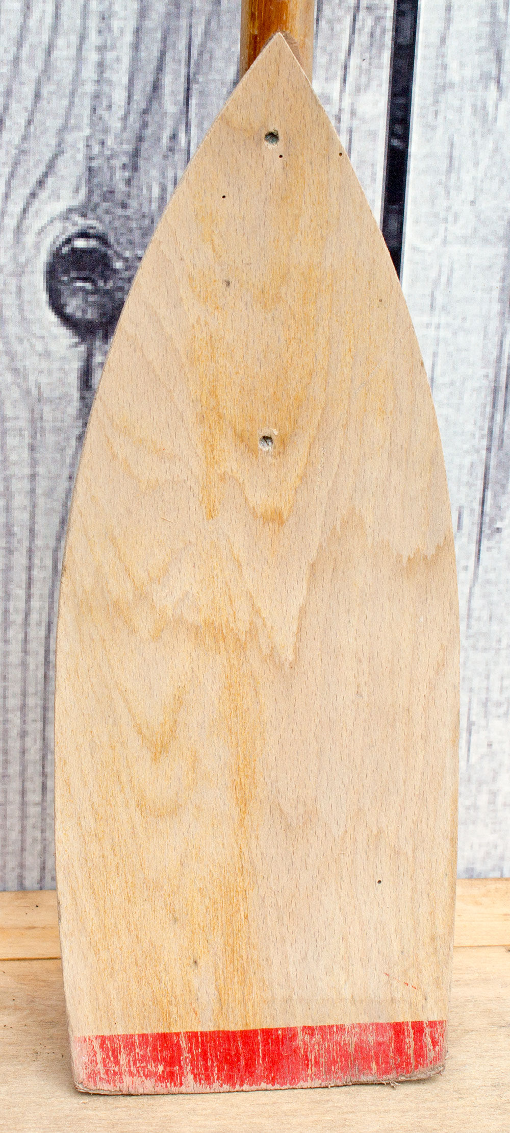 Old wooden paddle