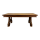 Renaissance-style oak dining table with lyre legs.