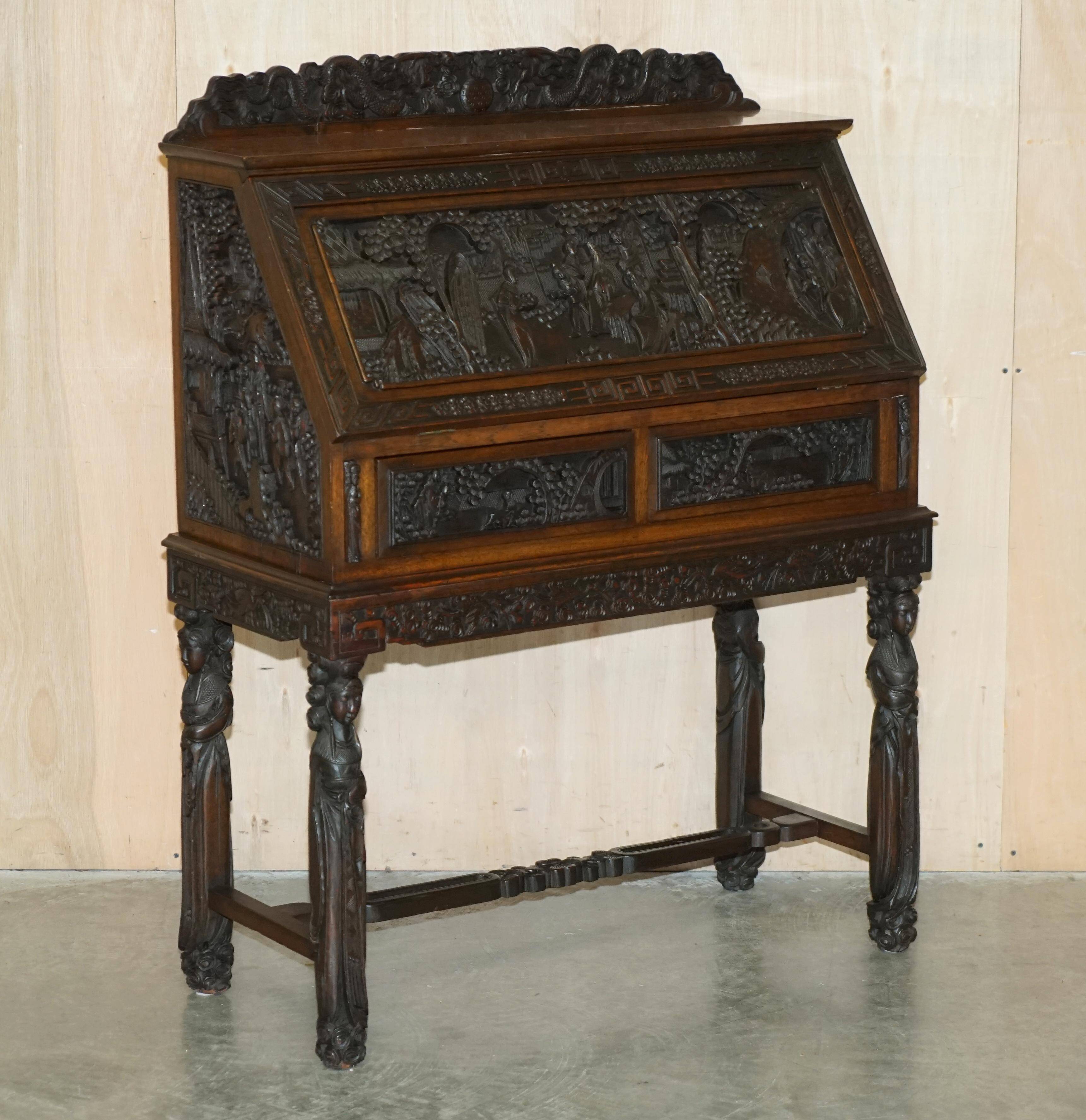 Chinese hand-carved desk from around 1940 with matching chair.