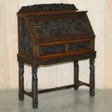 Chinese hand-carved desk from around 1940 with matching chair.