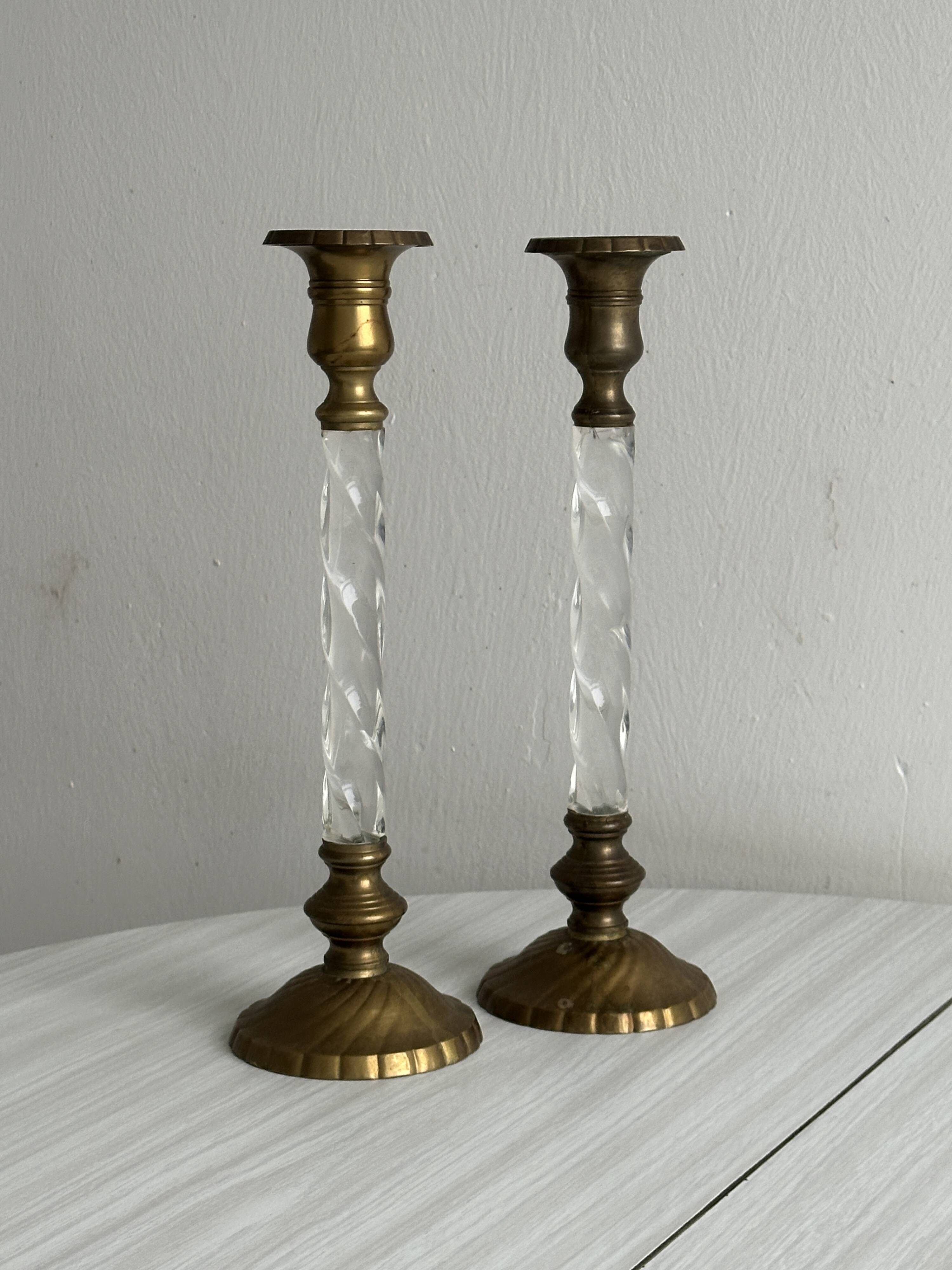 Pair of twisted metal and glass candlesticks