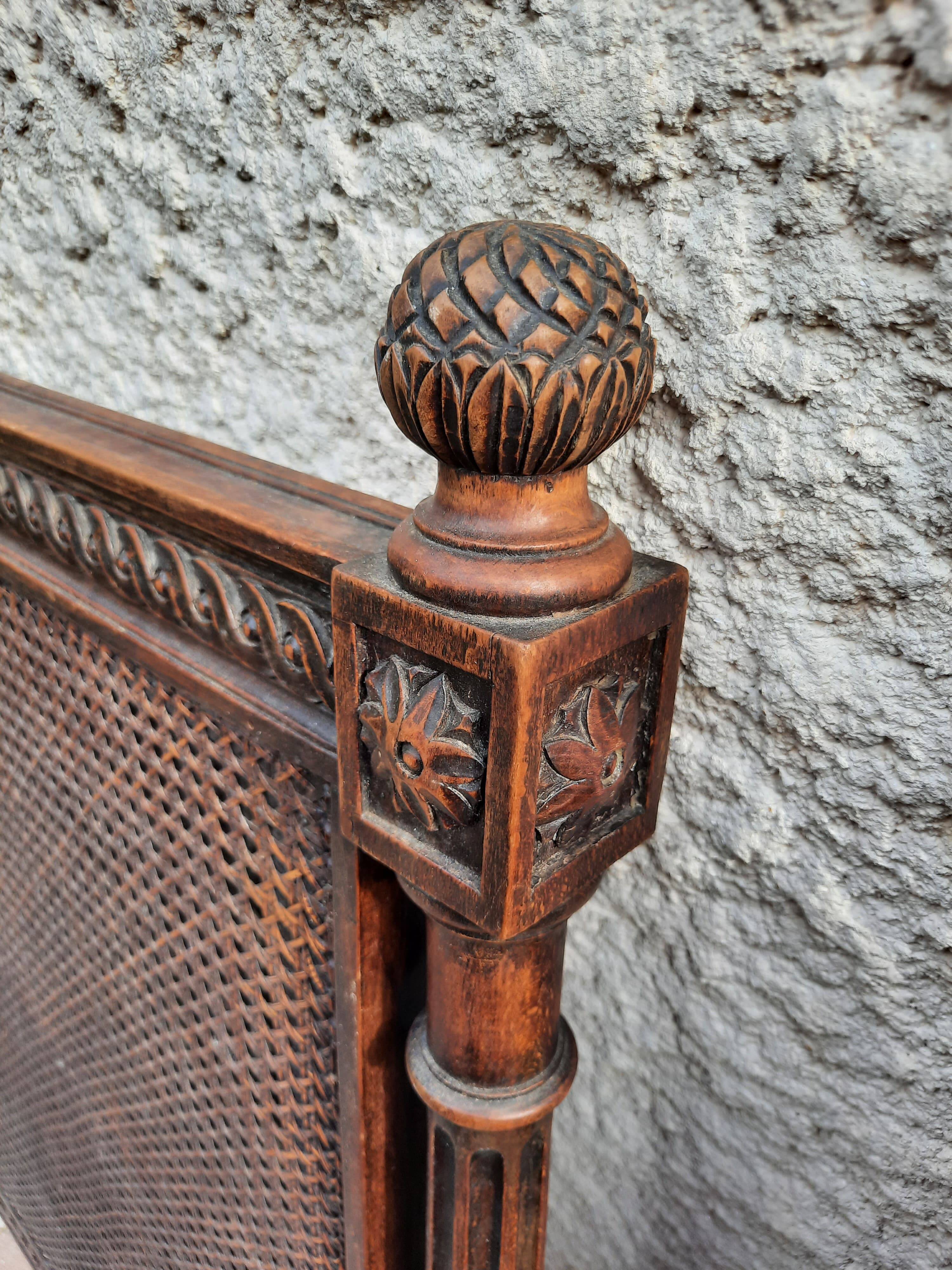 Hand-carved Louis XVI style headboards with chic vintage caning (1800s)