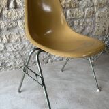 DSS fiberglass stacking chairs by Ray and Charles Eames for Herman Miller