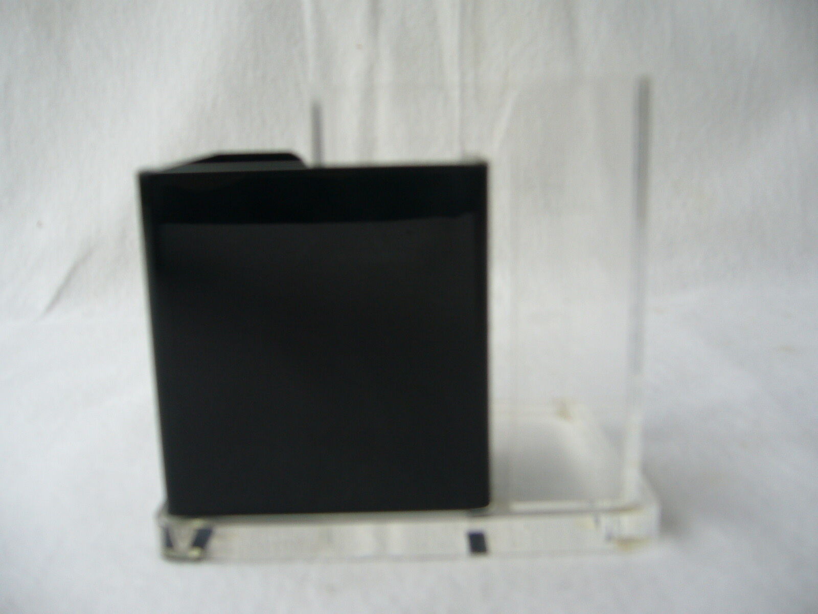 Vintage pencil jar in black and white plexiglass