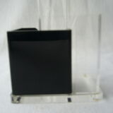 Vintage pencil jar in black and white plexiglass