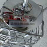 Articulated chromed metal luminaire