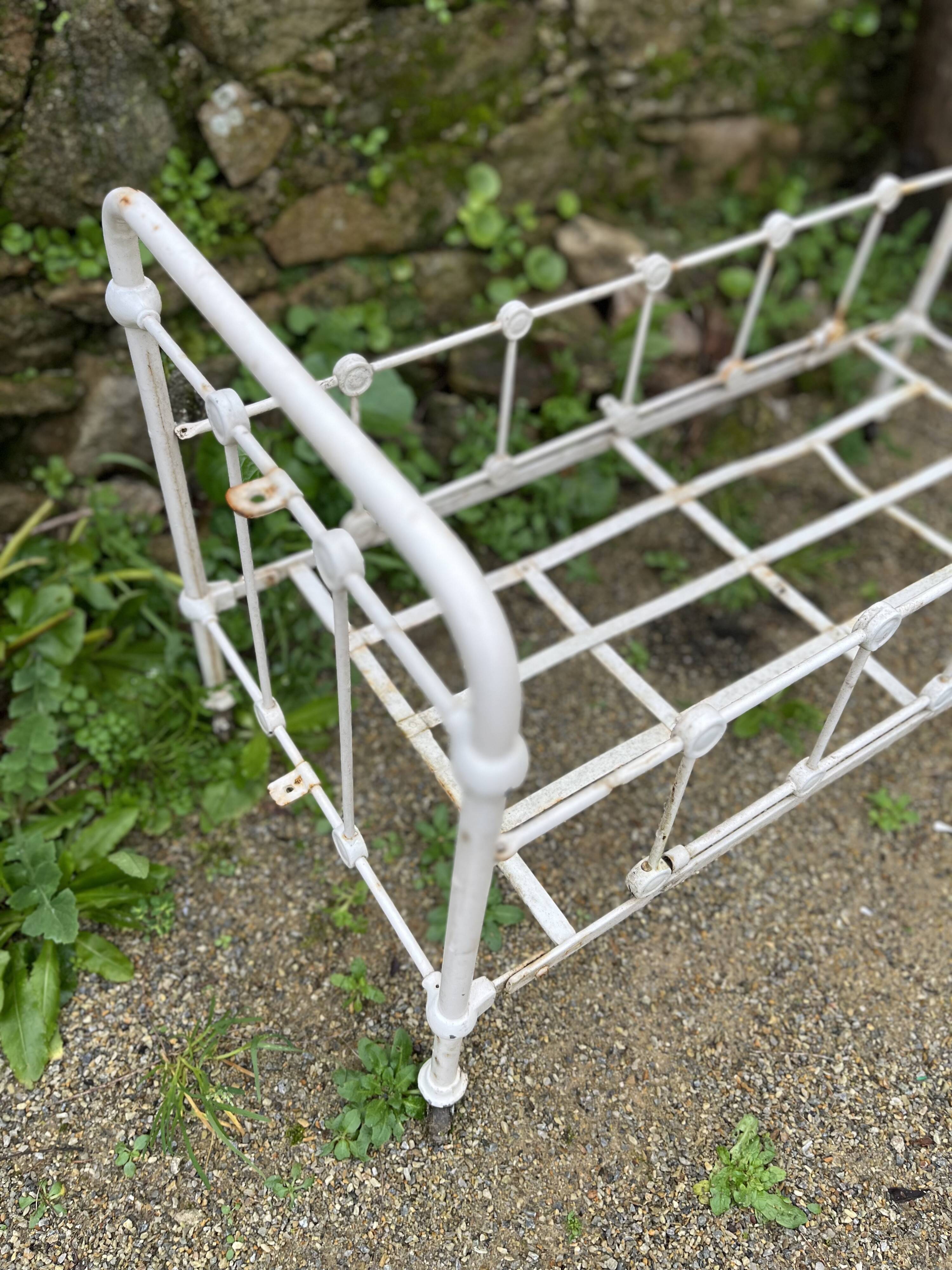 Old wrought iron doll bed
