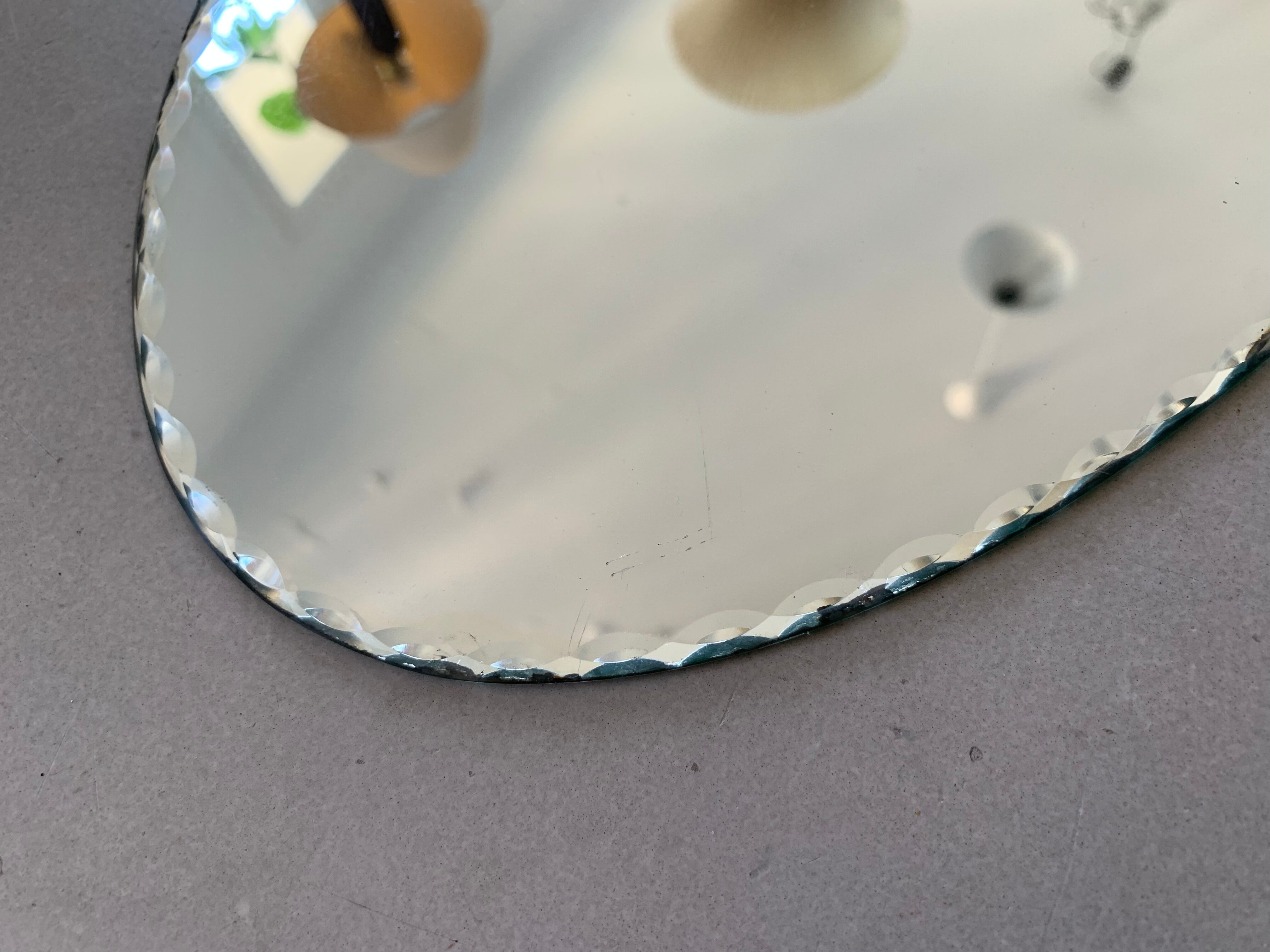 Old beveled oval mirror