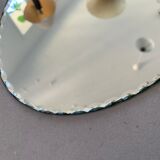 Old beveled oval mirror