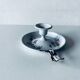 Antique enamelled metal candle holder