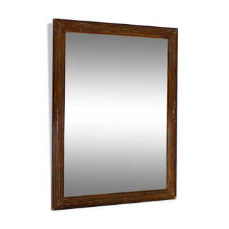 Old bevelled mirror, grooved brown frame