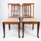 Ensemble de quatre chaises de salle à manger en palissandre et rembourré avec du tissu léger, années 1920