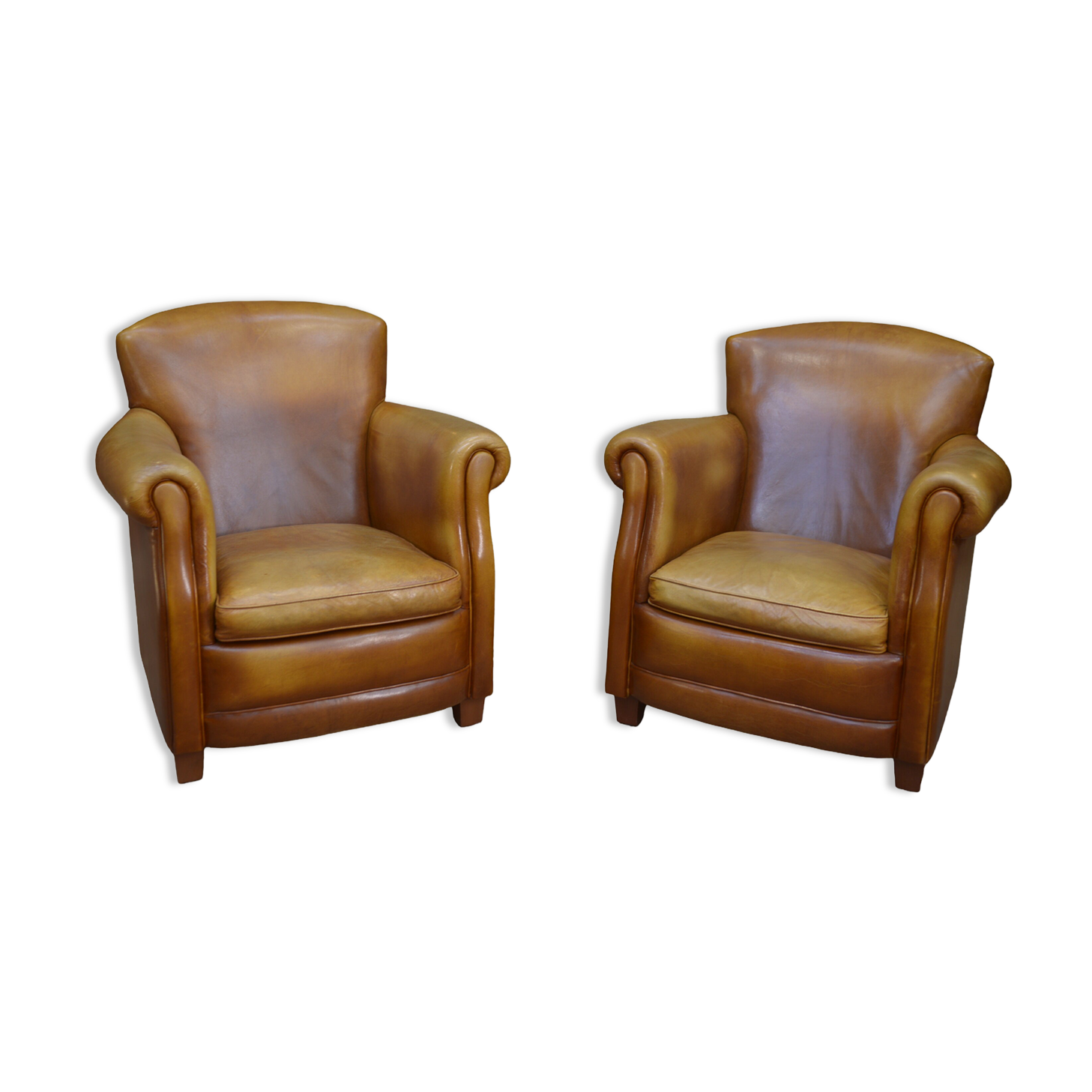 Pair of vintage leather club armchairs