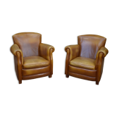 Paire de fauteuils club vintage en cuir