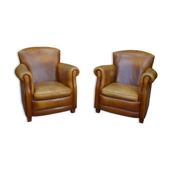 Paire de fauteuils club vintage en cuir