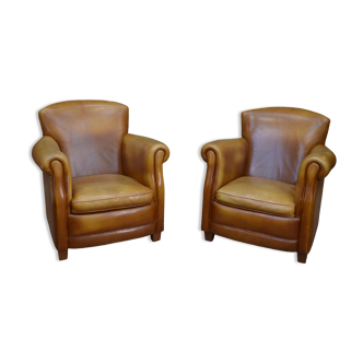 Pair of vintage leather club armchairs