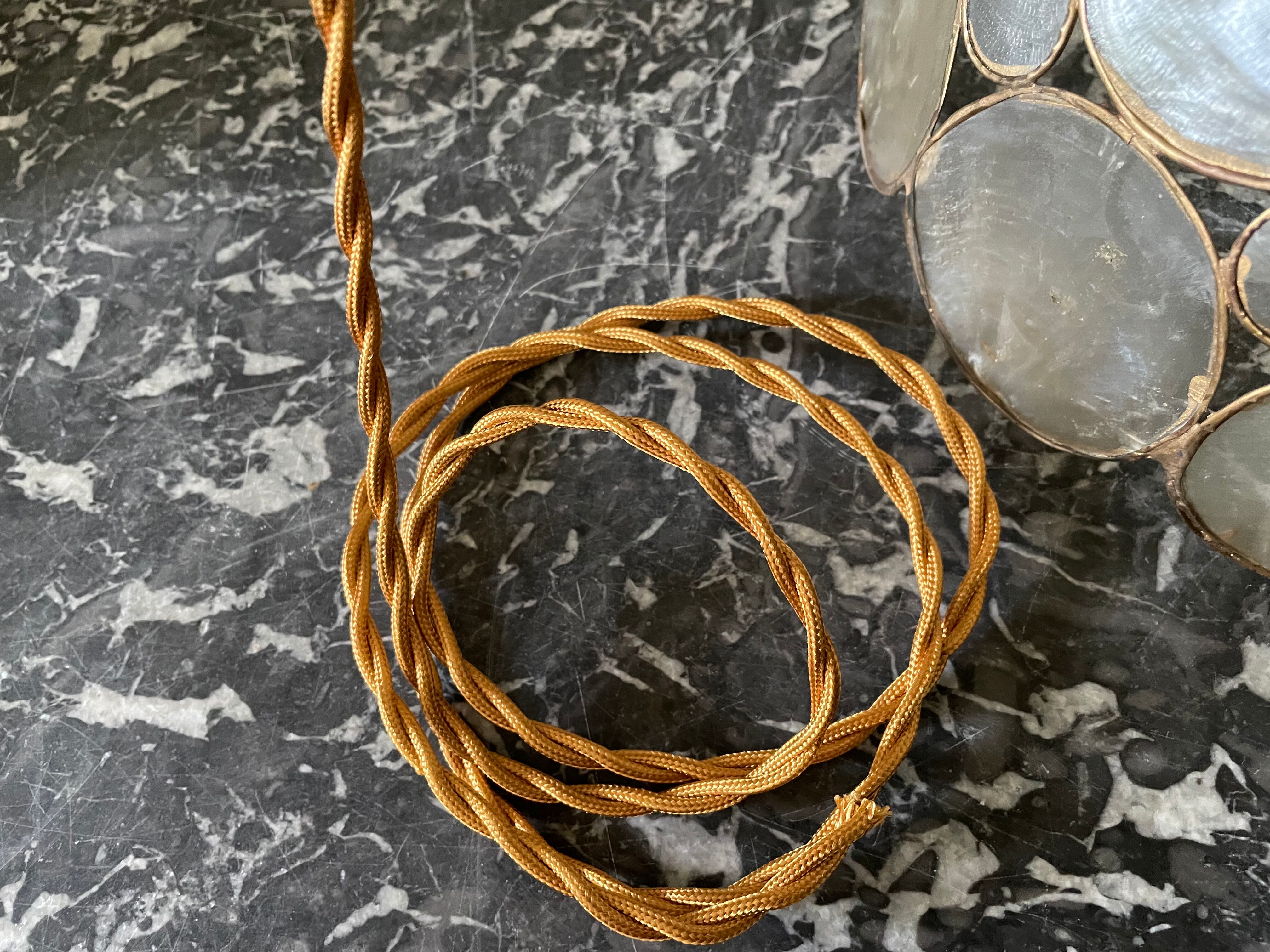 Suspension nacre et laiton