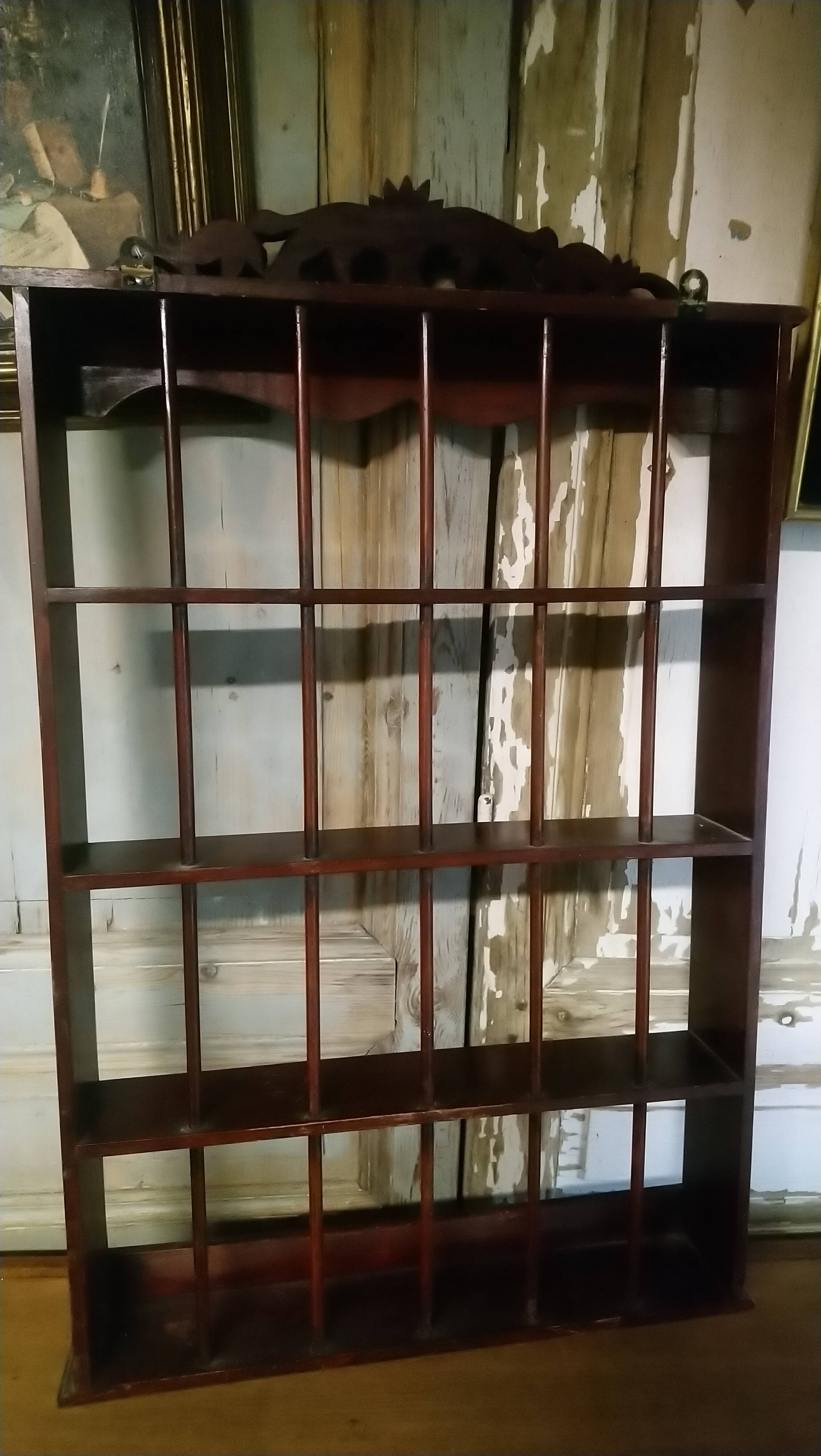 Carved wooden wall shelf for collection or other.