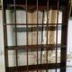 Carved wooden wall shelf for collection or other.