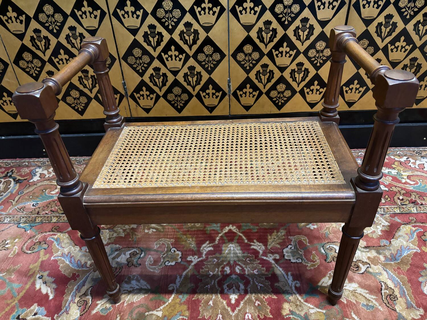 Small Louis XVI style cane bench