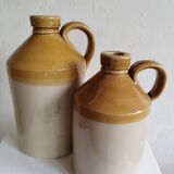 Duo of stoneware decanter bottles