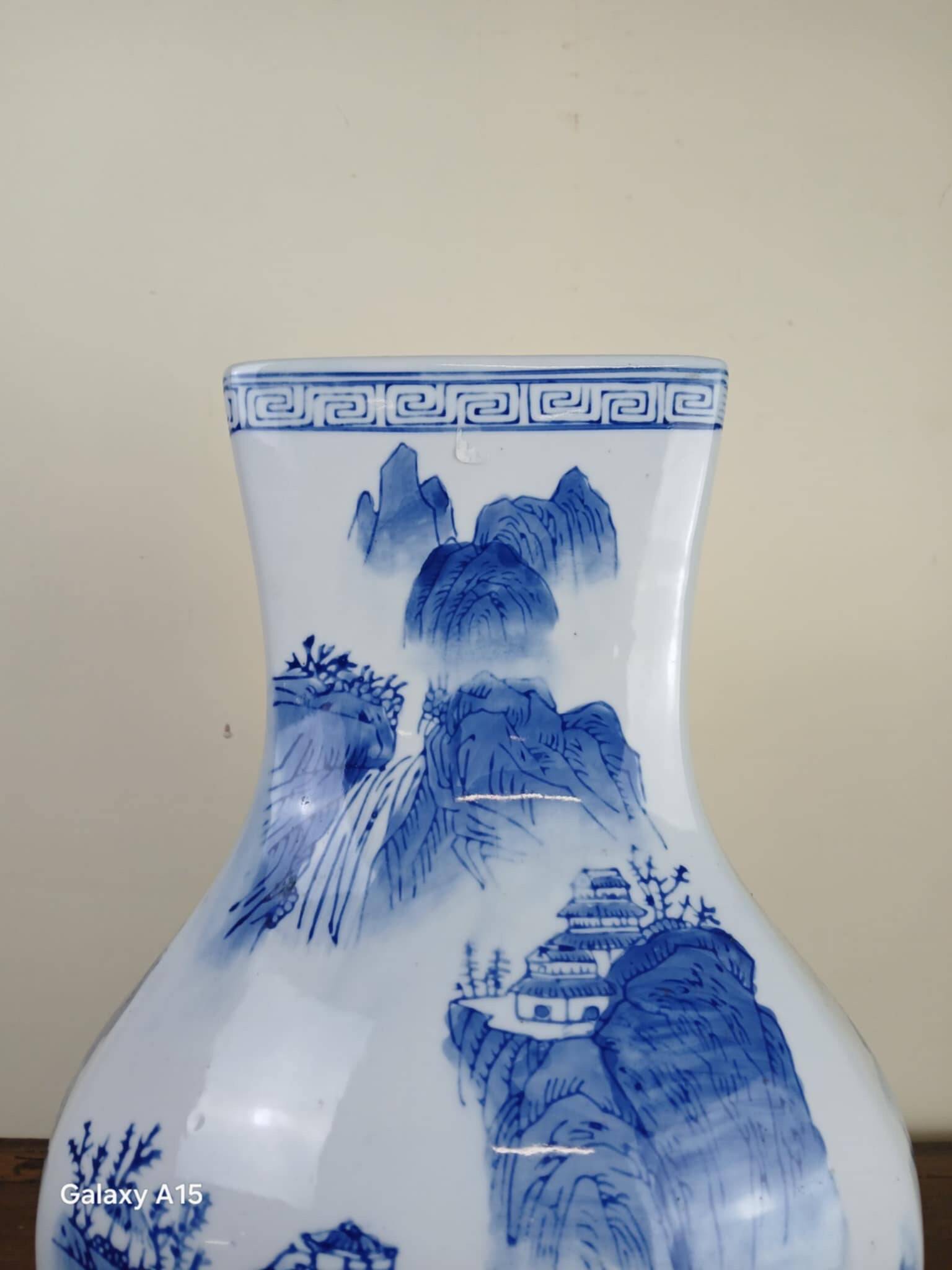 China circa 1920: porcelain vase with blue and white decoration
