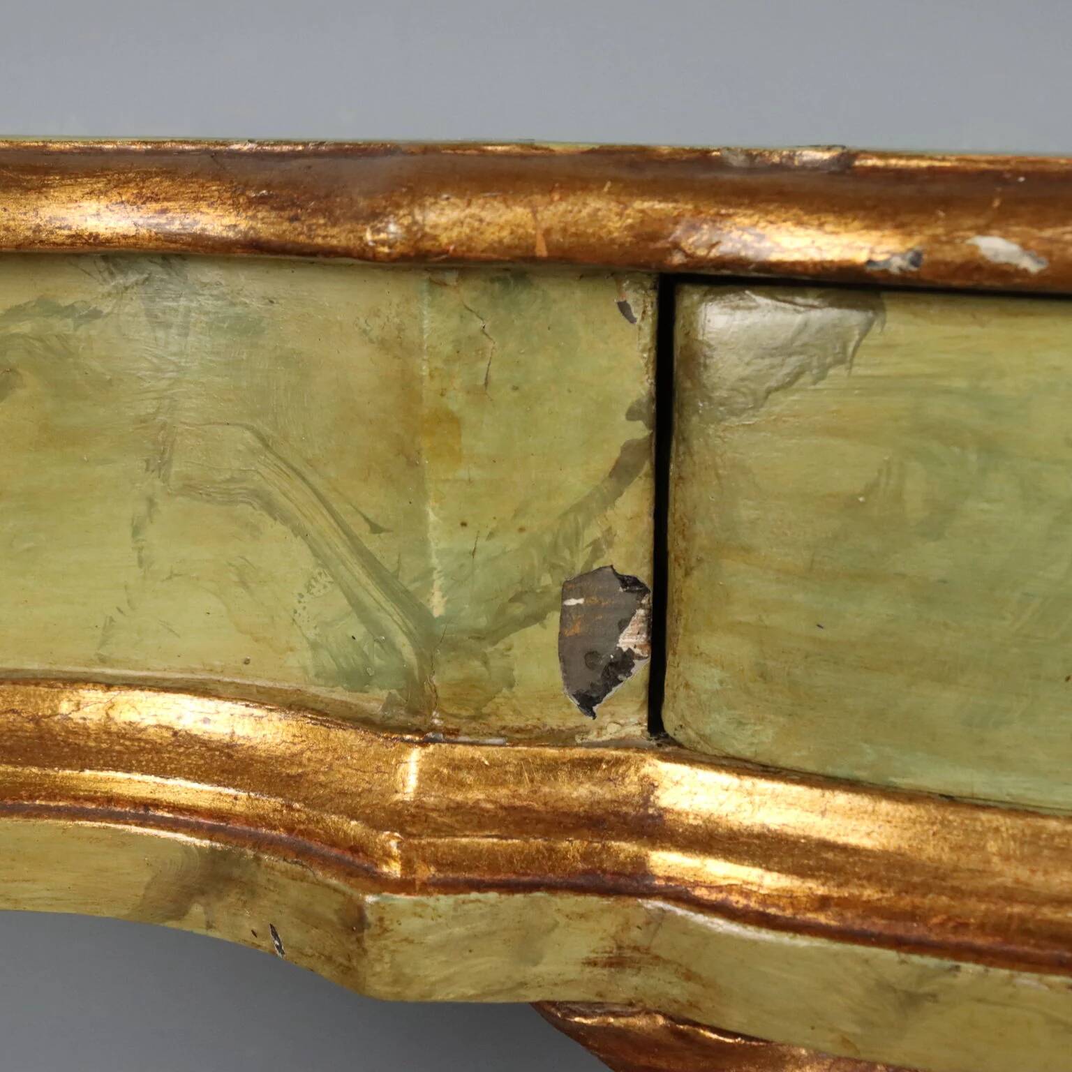 19th-century carved wooden drop-leaf console.