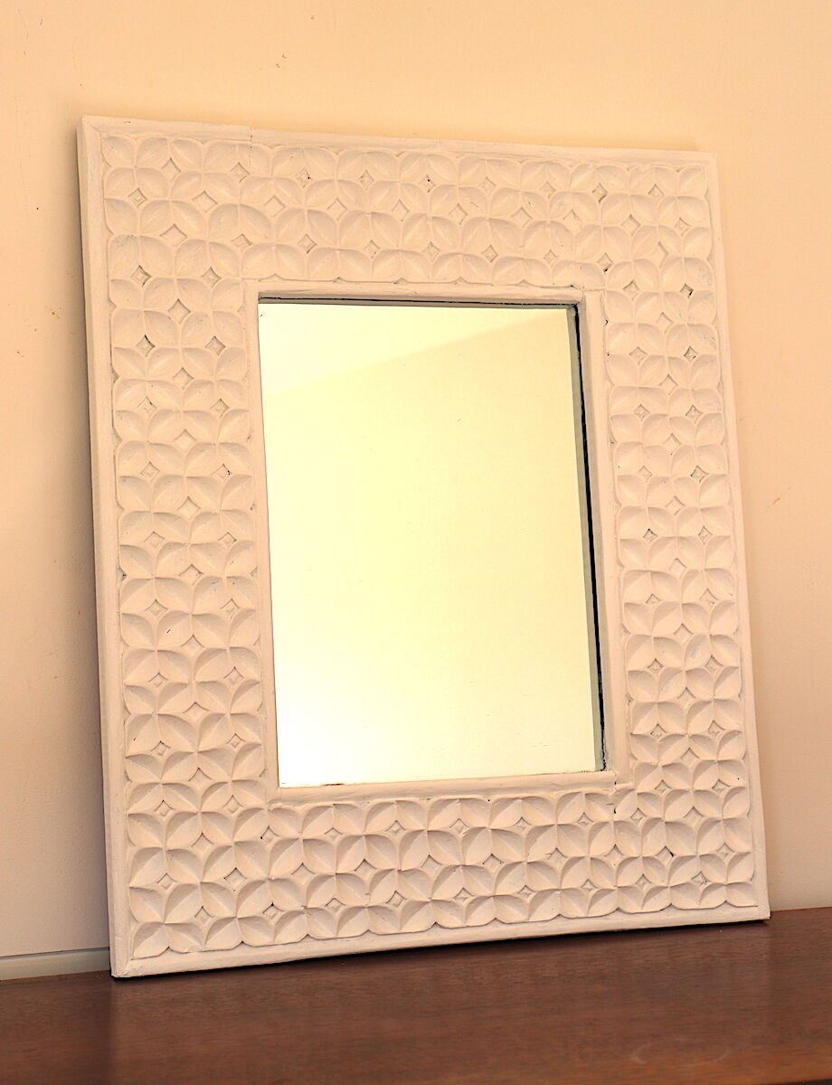 White mirror with carved flowers
