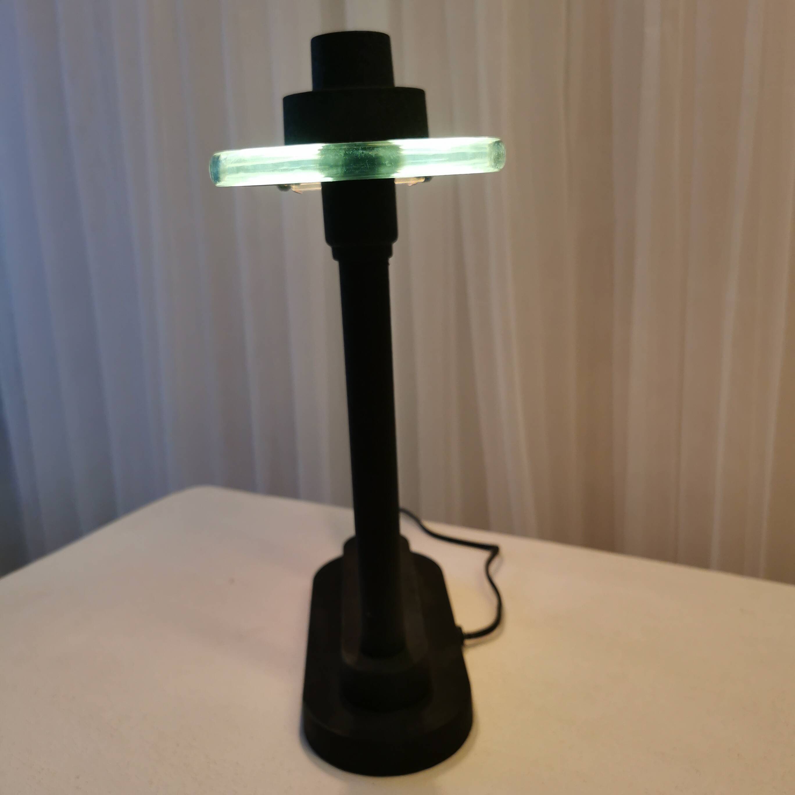 Desk lamp by “Robert Senneman”