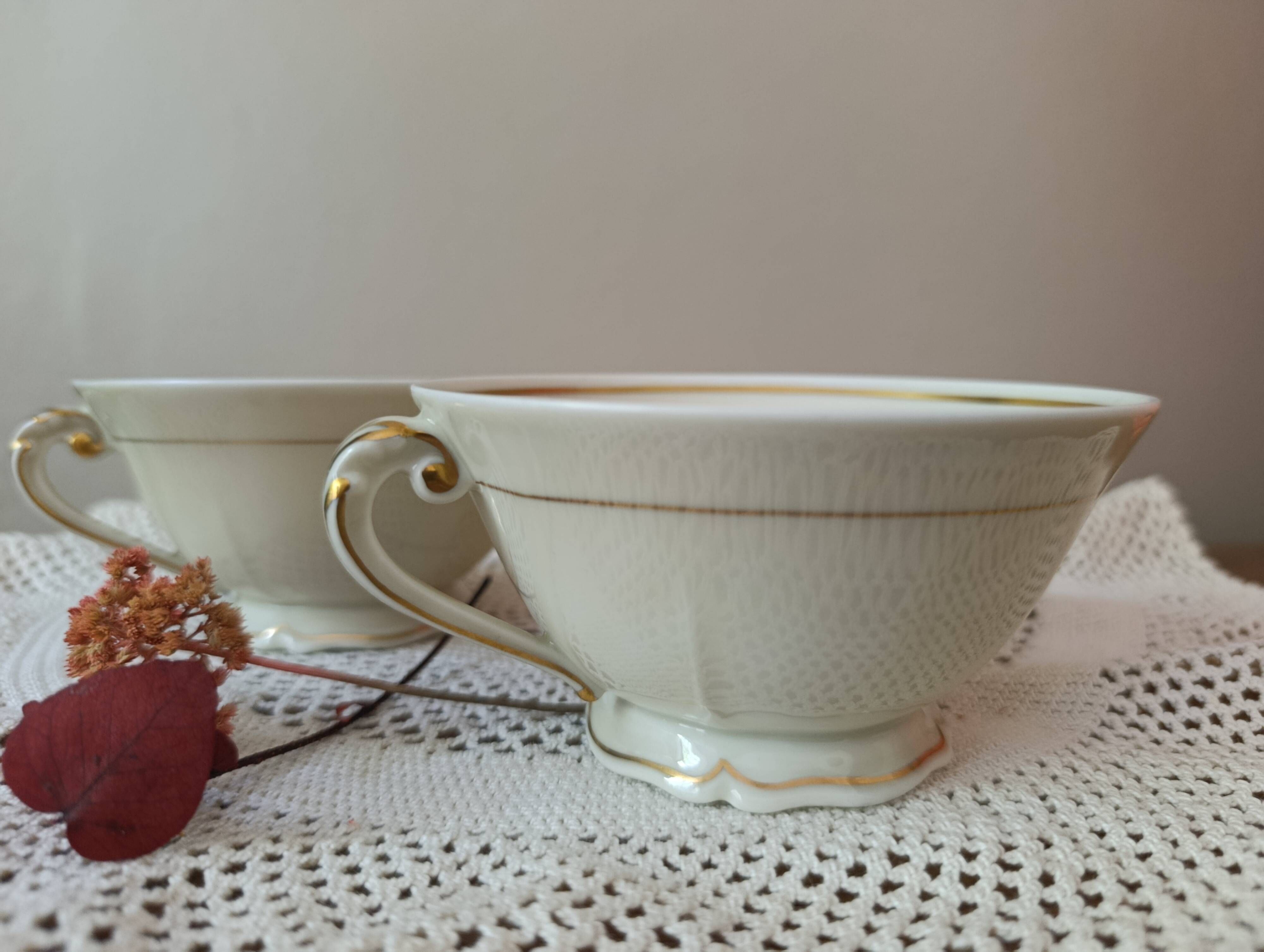 Two retro country-style porcelain tea cups, Former Royal Manufacture