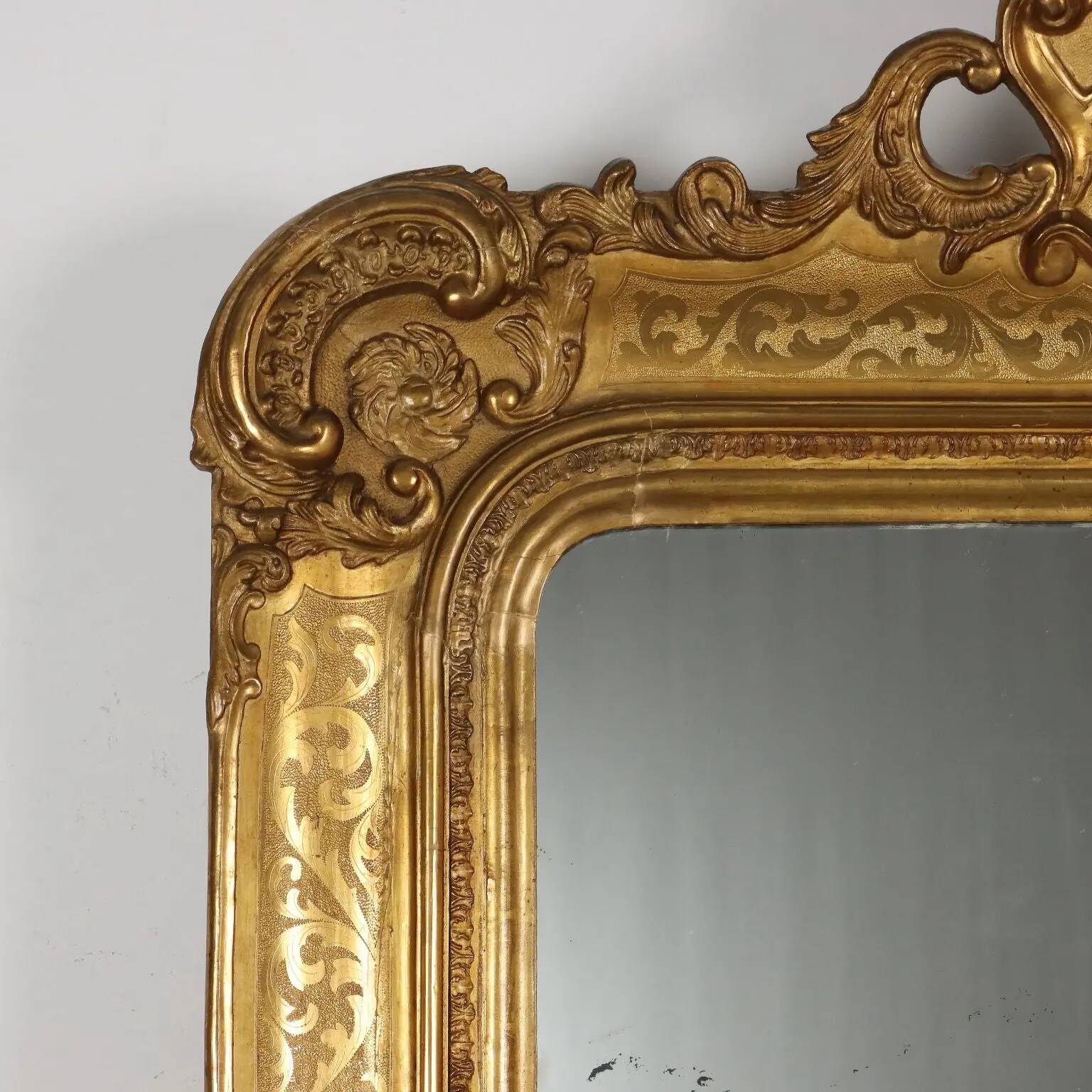 Antique mirror in carved fir, France, mid-19th century.