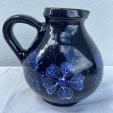 Blue ceramic pitcher