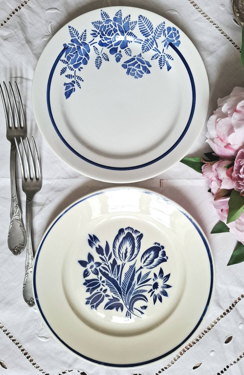 Mismatched antique flat plates accompanied by dishes.