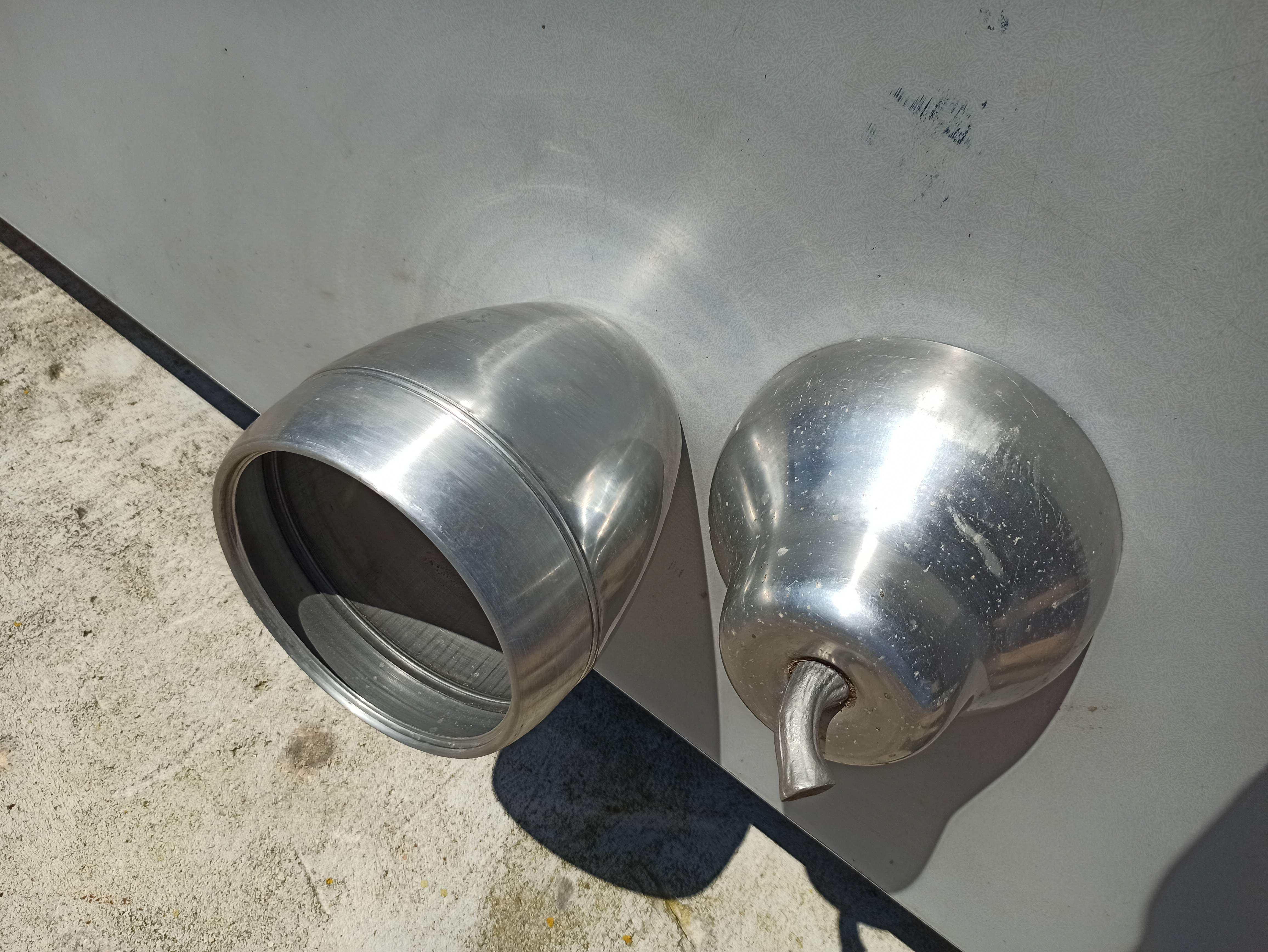 Old ice bucket ice cube in the shape of aluminum pear