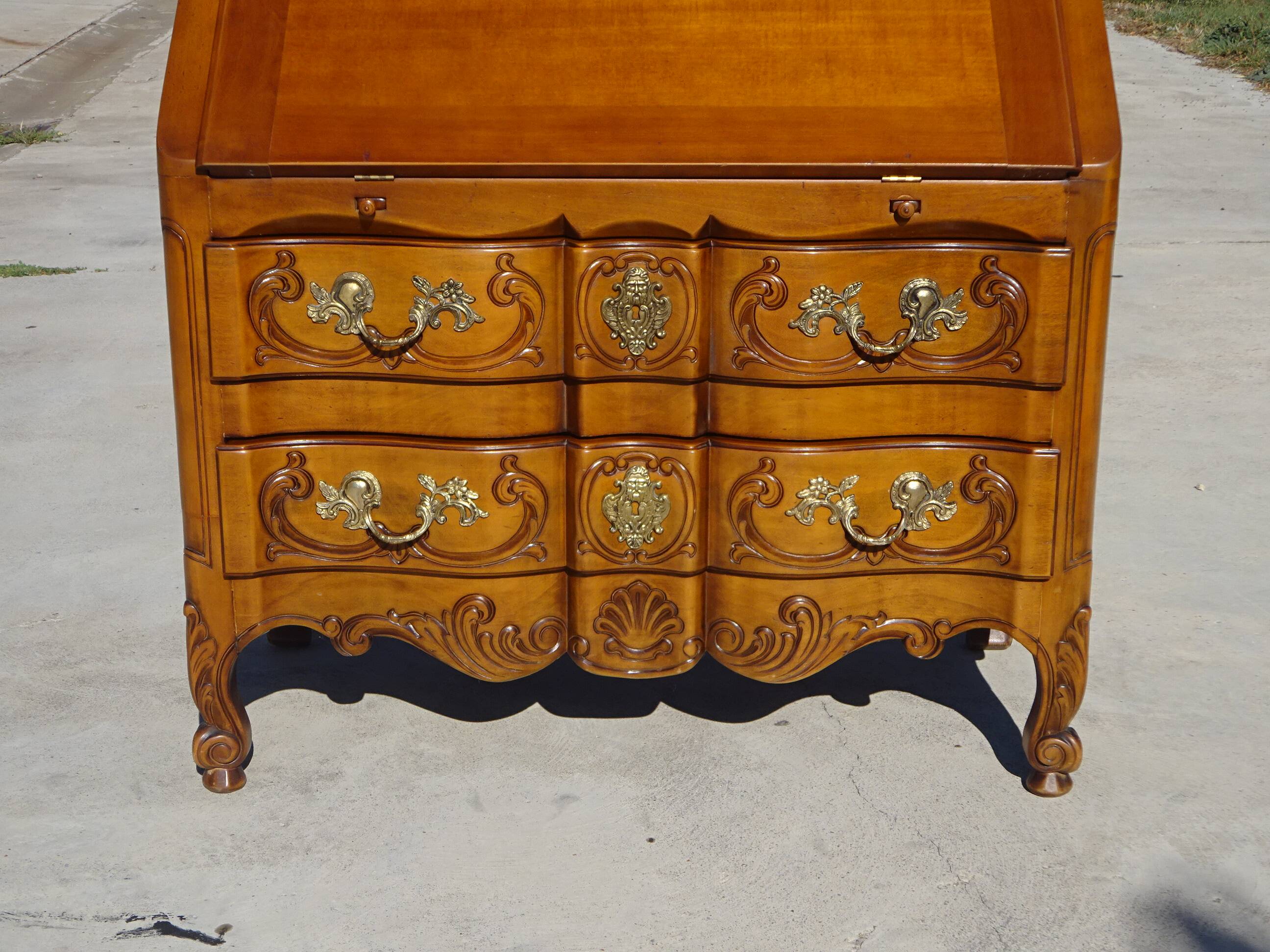 Secretary in solid cherry wood in Louis XV style.